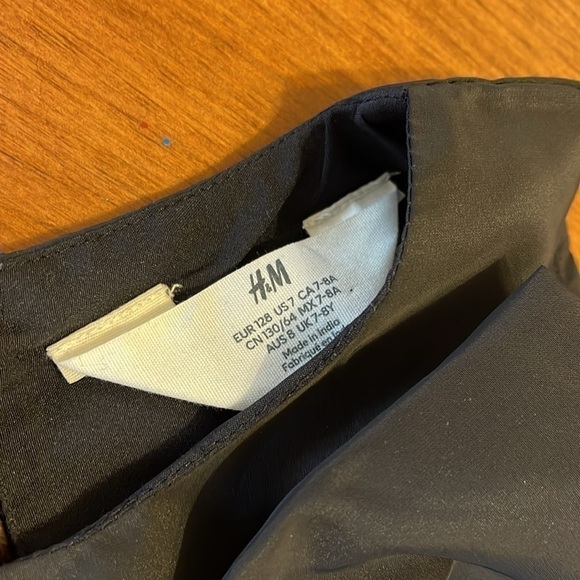 H&M black dress is bow size 7-8 years (Canadian) worn once! - Picture 3 of 6